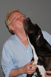 Richard Bradley with his dog Darcy. Big Kiss!