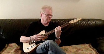 Richard Bradley with one of his guitars.