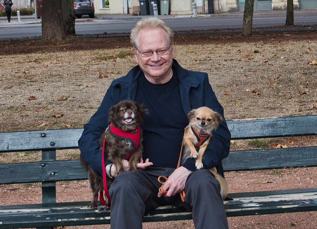 Richard Bradley in Dijon, France with his two dogs Gravy and Salsa.